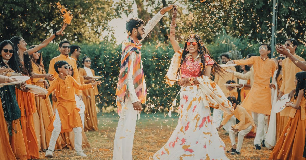 A large, colourful Indian wedding celebration
