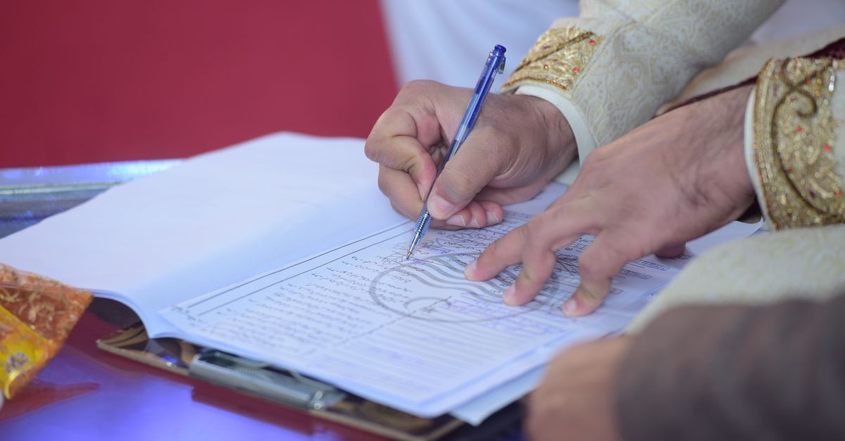 The signing of the nikah contract at a Muslim wedding